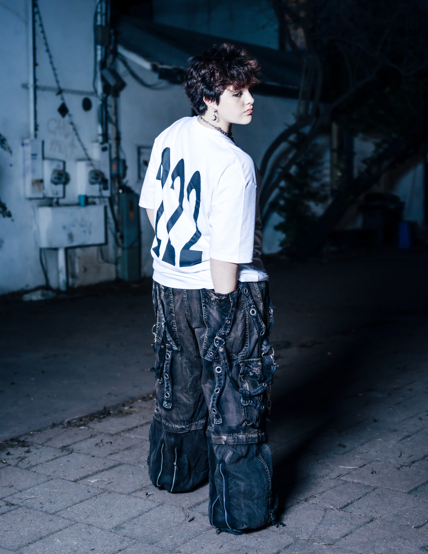 Modest Angel campaign, full-length look in an industrial alley